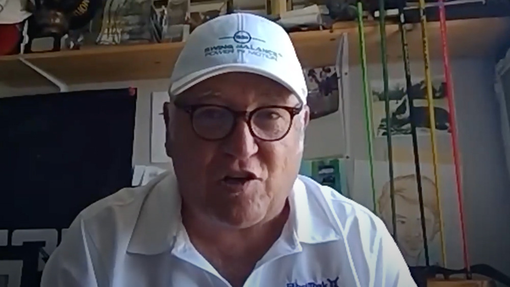 Swing Balance AI Founder in a white Swing Balance hat