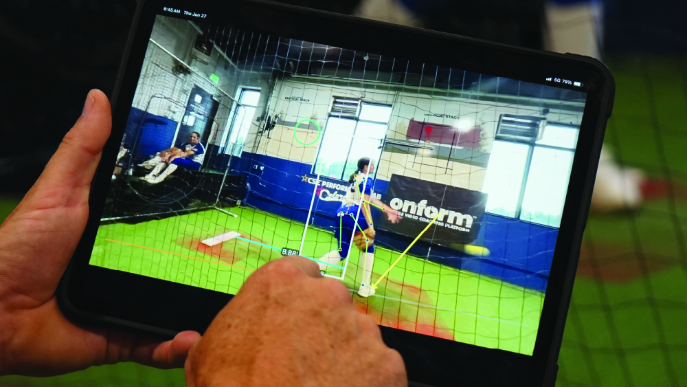 Image of fastpitch player on an iPad inside the Triple Crown Sports CSE Performance Lab