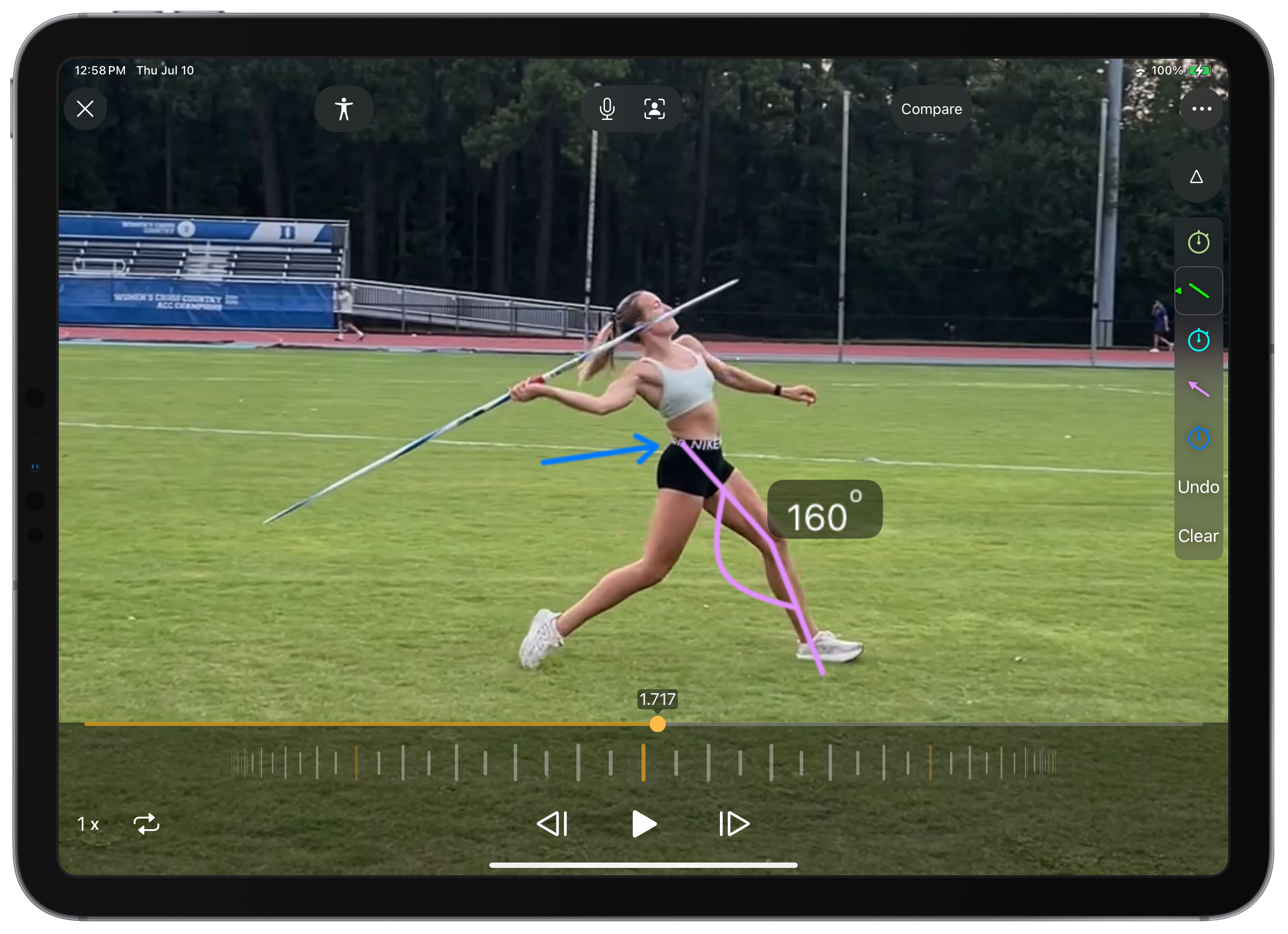 lexie keller, team usa heptathlete throwing the javelin on an ipad with onform app drawing tools pointing at her hip and her leg angle